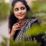 Subiksha Instagram - Soft as a flower yet strong as a storm 🤍🌪️ conceptualization : @arunprajeethm MUA : @jeru_bridal_studioo Costume : @sesha_bridalwear Photography : @xposurestudio.in #salwar #tradition #attractive #photooftheday #prettygirl #nomakeuplook #newpost #blackandwhite #photography #wavycurls #mesmerizing