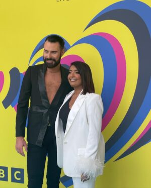 Sunetra Sarker Instagram - Well what a spectacular day and night it was! ⚡️⭐️ truly historic - epic Eurovision atmosphere - Watch all the highlights with me and @rylan tonight “Eurovision Welcomes the World” BBC1 6.30pm @bbceurovision 
Stylist @krishanparmar_  Make-Up @marcosgmakeup hair @charliewilkinsonhair suit @nadinemerabi earrings @butlerandwilson shoes @kat_maconie ❤️🙏🏽 special secret support from @dollyjj @amy_lhickman @unconditionalpictures 😻