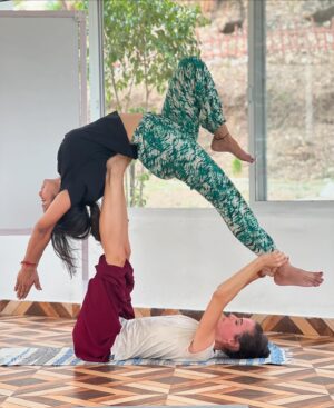 Sunitha Varma Instagram - Upside down smiles and endless laughter. That’s acro yoga! 🧘‍♀️ #acroyogafirsttry
.
.
.
#yogalife #acroyoga #acrofun #yogabliss #smiles #fun #acrolove #firstattempt