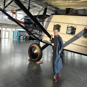 Suzanne Bernert Instagram - At the Dornier Museum in #friedrichshafen 
wearing a super cute dress by #thehaimishliving #collabalert 
Pantheon Herringbone Weave dress perfect for winters paired with slim leggings jeans and my fav boots ! #japaneseinspired 
.
.
.
#indiameetsjapan #haimishlife #kawaii #longdresses #suzannebernert #dorniermuseum #madeinbharat