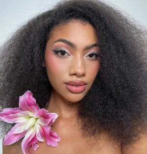 Sydney Martin Instagram - happy flower day🌸🌿
📸 @kssphoto_ 
💄 @maggie.overbaugh 

#beautymodel #naturalbeauty #photoshoot #naturalmakeup #work #lifestyle #art #curls
