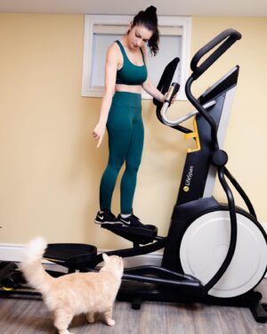Sydney Ozerov-Meyer Instagram - I tend to really struggle through the winter months, both physically and mentally. Over the years I’ve found that movement helps me enormously with both but I’ve often struggled with the discipline to be consistent with a routine (made worse by how uncomfortable I feel in public gyms). This year I have made it my priority to set up an at home routine that I can maintain before the winter months set in to put my health first in a way that works for me.
An elliptical is my go to. It’s super low impact for my joints, an amazing full range of motion and great for a warm up or full workout. I was geeked to find the @lifespan_fitness elliptical that somehow requires no power and yet has a full digital program? It’s the perfect stride length and has a 30 day money back guarantee. If there’s one piece of at home gym equipment that felt essential to my winter setup. This is it. Wish me luck!!