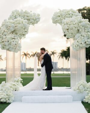 Sydney Sadick Instagram - Introducing… Mr. and Mrs. Adams! 🤍
Truly the most magical day of my life! ✨ I can’t wait to spend forever with you, @adamamos11 

Thank you to everyone who made yesterday possible, especially my mom! 

📸 @sunnyleephoto 
👗 @moniquelhuillier 
🌸 @bircheventdesign 
📝 @rackelgehlsenweddings 
💄 @natalie_la 
👱🏻‍♀️ @hairbyalisonfarfan