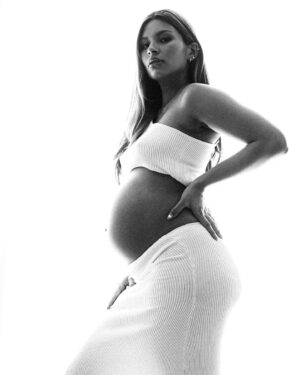 Tabitha Nauser Instagram - 39 weeks this Sunday!! 🐣 
Woke up yesterday, and on a whim, decided it was gonna be picture day (before Baby surprises us with her arrival and we miss our window) 
Lou whacked out his Photographer Hat and shot all the pictures in our living room and edited them too. I loved that we got to do it together, just the 2 of us 🥰 But we did have a really hard time picking which photos we liked, so for now I’ll share this one, and then maybe share the rest later? 

I didn’t document much of my pregnancy - hardly any pictures, even lesser videos. I think because my bump was on the smaller side for majority of my pregnancy, I didn’t feel pregnant most of the time.. and so talking about my pregnancy or “showing off” my bump made me feel silly, like I was making a big deal out of nothing 😖 
Looking back on it now i wish I wasn’t so insecure, especially since I’ve enjoyed every bit of my pregnancy SO much. 

Ladies, if you’re pregnant, take ALL the pictures and videos - be extra!!! be loud and proud, no matter how your pregnancy is going because you’re growing a full human!!!! 
Take it from me, you’ll want the mems to look back on ☺️ xx