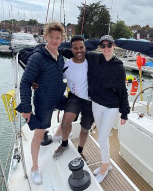 Talulah Riley Instagram - 🏴‍☠️ Hanging (literally) at the top of the mast of a 52’ yacht... @cowes_week was awesome fun 🏴‍☠️ 

🌊 We came last in our race. By 40 minutes. The spinnaker sheet got tangled around our engine. We tore our jig-sail. The cutlery drawer below deck came out and sent knives and forks whizzing everywhere. And we bumped into a huge yacht when mooring… but everyone kept their full compliment of fingers, and no one got hit on the head by the boom. 🌊 

💙 A BIG thank-you to @mustoclothing for kitting us out with proper sailing gear. I have loved you forever (used to wear your jackets out riding as a little girl). And thank you @chathamfootwear — not worn boat shoes before and now never want to take them off. They’re as comfortable as slippers!! 💙

🍹It was exciting when the  @mountgayrum boat came and delivered drinks (even kindly providing ginger beer for us non-drinkers. Or maybe I stole the mixer..?). Thomas was so rum-happy he held his cup right in front of my face for the photo…🍹

🦞 Oh, and I got so very sunburnt that my lips actually swelled up. I didn’t know that could happen. 🦞

✨We had the calmest, nicest skipper imaginable. Thank you very much @germaine_sail ✨

And top, top, talented team mates: @victorilou @charlottehawkins1 @chrisrobshawrugby @camillakerslake 

📸 Thank you @maxcisottiphotographer for your excellent company and action shots 📸 

And thank you @zafrushdie and @greenroomvip for the whole experience xx