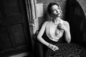 Talulah Riley Instagram - @pistol actor Talulah Riley  @talulahrm who please iconic @viviennewestwood for @1883magazine with @olgatimofejeva @alexisdayhmu @bentalbott @premierpersonalpr #dannyboyle #sexpistols #disney #viviennewestwood #photography #leemalone #fashion #editorial #style #blackandwhite #talulahriley #actor #women #classic #hollywood #cartier