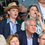 Talulah Riley Instagram – 🎾Have been in giggles for days at these candid shots from @wimbledon 🎾

🍾We posed very demurely at the @champagnelanson sign — Thank you, Lanson, for having us! And for feeding us all day long (lamb wellington, strawberries-and-cream, afternoon tea, pick-and-mix to take to court, lots of Lanson for Thomas. Yum.) But didn’t quite realise how visible we were (all day long…) while watching the tennis. 🍾

I usually describe myself as ‘stoic,’ but having seen these images I’m quite sure I can no longer make that claim… 

In a previous era, these might also be titled: ‘Why not to take your girlfriend to a sporting event.’ I honestly don’t know why I’m yawning/appear to be asleep in a lot of these shots. I was genuinely riveted by the matches. And thank you again, @champagnelanson for having us and for your very generous hospitality. 

🖤🧷It was also lovely to have a mini @pistol reunion with @emmajappleton🧷🖤

💙And thank you @mrselfportrait for the loan of such a pretty dress. I really loved it. 💙 

✨Finals today. Unfortunately I’m not at Wimbledon, but will be cheering for @djokernole ✨

photo credit: @gettyimages