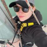 Talulah Riley Instagram - 🏴‍☠️ Hanging (literally) at the top of the mast of a 52’ yacht... @cowes_week was awesome fun 🏴‍☠️ 🌊 We came last in our race. By 40 minutes. The spinnaker sheet got tangled around our engine. We tore our jig-sail. The cutlery drawer below deck came out and sent knives and forks whizzing everywhere. And we bumped into a huge yacht when mooring… but everyone kept their full compliment of fingers, and no one got hit on the head by the boom. 🌊 💙 A BIG thank-you to @mustoclothing for kitting us out with proper sailing gear. I have loved you forever (used to wear your jackets out riding as a little girl). And thank you @chathamfootwear — not worn boat shoes before and now never want to take them off. They’re as comfortable as slippers!! 💙 🍹It was exciting when the @mountgayrum boat came and delivered drinks (even kindly providing ginger beer for us non-drinkers. Or maybe I stole the mixer..?). Thomas was so rum-happy he held his cup right in front of my face for the photo…🍹 🦞 Oh, and I got so very sunburnt that my lips actually swelled up. I didn’t know that could happen. 🦞 ✨We had the calmest, nicest skipper imaginable. Thank you very much @germaine_sail ✨ And top, top, talented team mates: @victorilou @charlottehawkins1 @chrisrobshawrugby @camillakerslake 📸 Thank you @maxcisottiphotographer for your excellent company and action shots 📸 And thank you @zafrushdie and @greenroomvip for the whole experience xx