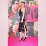 Talulah Riley Instagram – Well, I loved the @pistol London premiere. So wonderful to be reunited with the cast/crew and to celebrate with our families and friends. 

Thank you @sportmax for this wonderful PVC creation. And @jimmychoo for the heels. And the very cool earrings from @klotodesign 🖤 

Mr. Brodie-Sangster and I crumpled in the Evening Standard… a good night was had by all! 

make-up: @babskymakeup 
hair: @earlsimms2 
stylist: @chercoulter 

PISTOL is out on @hulu and @disneyplusuk May 31st 🖤🖤🖤