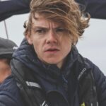 Talulah Riley Instagram - 🏴‍☠️ Hanging (literally) at the top of the mast of a 52’ yacht... @cowes_week was awesome fun 🏴‍☠️ 🌊 We came last in our race. By 40 minutes. The spinnaker sheet got tangled around our engine. We tore our jig-sail. The cutlery drawer below deck came out and sent knives and forks whizzing everywhere. And we bumped into a huge yacht when mooring… but everyone kept their full compliment of fingers, and no one got hit on the head by the boom. 🌊 💙 A BIG thank-you to @mustoclothing for kitting us out with proper sailing gear. I have loved you forever (used to wear your jackets out riding as a little girl). And thank you @chathamfootwear — not worn boat shoes before and now never want to take them off. They’re as comfortable as slippers!! 💙 🍹It was exciting when the @mountgayrum boat came and delivered drinks (even kindly providing ginger beer for us non-drinkers. Or maybe I stole the mixer..?). Thomas was so rum-happy he held his cup right in front of my face for the photo…🍹 🦞 Oh, and I got so very sunburnt that my lips actually swelled up. I didn’t know that could happen. 🦞 ✨We had the calmest, nicest skipper imaginable. Thank you very much @germaine_sail ✨ And top, top, talented team mates: @victorilou @charlottehawkins1 @chrisrobshawrugby @camillakerslake 📸 Thank you @maxcisottiphotographer for your excellent company and action shots 📸 And thank you @zafrushdie and @greenroomvip for the whole experience xx