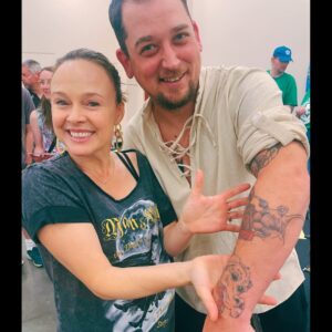 Tami Stronach Instagram - Look what I spotted!

I had the absolute pleasure of meeting an incredible fan with the most magical Falkor & Bgolus tattoos! 

It’s moments like these that remind me of the timeless magic of ‘The NeverEnding Story’ and how it continues to inspire and connect us all. 

‘Never give up and good luck will find you.’

And speaking of magic, don’t forget that tickets for ‘Man & Witch: The Dance of a Thousand Steps’ go on sale this Friday, June 7th! Get ready to embark on a new enchanting adventure.

Thank you to all the amazing fans who keep the spirit of Fantasia alive. 

Who else has a magical memory or tattoo to share? Let’s celebrate our never-ending stories together! 

#NeverEndingStoryCon #NeverEndingStory40 #ChildlikeEmpress #FanArt #Falkor #ManAndWitchMovie #MagicalAdventure #TamiStronach