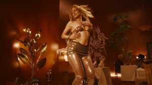 Tanu Muino Instagram - @jlo - Can’t Get Enough feat. @latto777
I wan’t to stop and appreciate this moment. 
Jennifer has played a huge role in why I became a music video director. Her music and videos have been inspiring me since I was a child.
Making this video for her means a lot to me. It’s like a dream come true.
I want to thank you @jlo for being so nice, fun, open, hardworking and collaborative with me.
Thanks for having me. LOVE.

So much people are involleved and make it all happened. Thank you guys, I love you!
Director: Tanu Muino @tanumuino
Producer: Robert Katz @gatosamericana
Production Company: UnderWonder Content @underwondercontent
Executive Producer: Frank Borin @frankborin, Ivanna Borin @ivannaborin
DOP: Nikita Kuzmenko @nikitakkkuz 
Production Designer: Spencer Graves @nightwindow 
Jlo Management: Benny Medina
Jlo Management: Gilly Iyer
Jlo A&R: Brandon Riester
Latto Management: Kayla Jackson
Video Commissioner: Lucas Prevost @_lucasprevost
Director’s Rep: Nicole O’Connell @hart_represents

POST
Editor: Carlos Font Clos @carlosfontclos
Colorist: Joseph Bicknell @josephbicknell @company_3  VFX: TiltVFX @tiltvfx  VFX: Roma Onufriychuk @romafx 
Beauty: Kevin Kim / Bonch TV @kevinkimlalaland @bonchpost Conform: @digitalsword_
Additional Editor: Louis Palacios @louispalacios
Additional VFX: UPP @upp_vfx
Choreographer: Galen Hooks @galenhooks
Choreographer Asst: Jana Thompkins
1st AD: Braden Anderson @the_nomadx
Additional 1st AD: Jonas Morales @makingmovesmorales
Production Manager: Briana Goldberg @brigold
Production Coordinator: Timothy Kerigan @fullofpaint
Asst Production Coordinator: Kya Koplin @kiiokee
Gaffer: Scott Moody
Key Grip: Charles Lens @workingmaninc
2nd AD: Brian Steffen
2nd 2nd AD: Aimee Wu
Background Movement Director: Monika Felice Smith @monikafelicesmith
Background Chore Asst: Jen Apter @jenapter
Stunts: Danny Wayne @_danny_wayne
Stunt Rigger: Joseph Perez
Stunt Rigger: Max Heavenrich