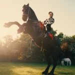 Tanu Muino Instagram – @harrystyles – Daylight 
Harry, nothing you can’t do. Flying, joggling, riding bikes and horse’s, walking on the rope, dancing (my favorite), and I just can only image what else you can )
Its so amazing to create a video on a music thats is in your favorites. Thank you for having me H, Love!
Thank you – amazing big team, who made it in one crazy daylight! 
Director: @tanumuino
Creative Director: @mollyjane_x
DOP: @nikitakkkuz 
Label: @columbiarecords
Commissioner: @bryanyounce
Production Company: @underwondercontent
Producer: @mauriziovontrapp
Exec Prod: @frankborin @ivannaborin Matthew Fone 
Service Co: @riffrafffilms
Production Designer: @nightwindow
Choreographer: @hollytblakey 
Artist Stylist: @harry_lambert
Editor: @carlosfontclos
VFX: @tiltvfx @romafx
Colorist: @josephbicknell @company_
1st AC:  @samrawlings110
2nd AC: Ben Casciello-Rogers
2nd AC:  @williamcrafts
Camera Trainee: Grace Pogonoski 
Ronin Technician: Joe Redman
DIT: @davisdaviskristin
1st AD: @jailusser
2nd AD: @niomiemmacollins
3rd AD: @conorj_oyce
Runner: Liam Offord 
Runner: Milo Manolson
Runner: @__maddysmith
Runner: @sophiakawyani
Location Manager: @mrwaterhouse
Location Assistant: Andrew Conteh  Location Assistant: Lewis Chandler
Key Grip: @tomjrnorth
Crane Grip: Billy Smith
Crane Grip: Aaron McDonaugh 
Head Crane Tech: Tim Dean
Crane Tech: Daniel Huddy
Gaffer: @elliot_be
Electrician: Paul Rowe
Electrician: Paul Hill
Electrician: Max Halstead
Electrician: Sedge Wick
Electrician: Sam Alberg
Electrician: Matt Markham
Lighting Rigger: Joe O’Brian
Lighting Rigger: Danny Grove
Art Director: @jamesmid
Prop Assistant: @gracesnellock
Art Assistant: @addles
Art Assistant: @phoebe__
Art Assistant: Jack Evill 
Art Assistant: @karen.hettey
Art Assistant: Melis Oyzoyn 
Scenic Artist: @melissawickhampaints
Costume Designer: @spencerhorne1
Assistant Wardrobe: @callump91
Assistant Wardrobe: @CEeej
Assistant Wardrobe: Louise Byford 
Assistant Wardrobe: Sabrina Picci
Sound Op: @simon_haggis_sound
Sound Assistant: Declan Chew
Makeup Artist: @georgiahopemakeup
Makeup Assistant: @martinaderosa_mua
Makeup Assistant: @shanimushington
Makeup Assistant: @coco.hirani
Hair Stylist: @oskarperahair