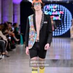 Tara Strong Instagram – My kid @adenjstrong modeling @lafw @artheartsfashion for the brilliant & joyous @tavi.art_ 💜🧡💜🩷🩵🧡💜🩷