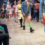 Tara Strong Instagram - My kid @adenjstrong modeling @lafw @artheartsfashion for the brilliant & joyous @tavi.art_ 💜🧡💜🩷🩵🧡💜🩷