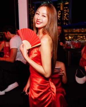 Tasha Low Instagram - painting the town red w @revolve❣️❤️