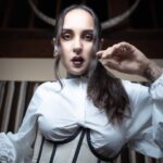 Tatiana Shmayluk Instagram - “Am I Evil? Yes, I Am” • 🕷️Halloween’s around the corner! 🕸️ And as most of you adore this holiday, I thought it would be a perfect time to drop another small selection of prints (LIMITED). This one is a lost gem that I absolutely love because of the turn the photoshoot had taken (the horns are a part of a bull’s skull hanging behind my head, which helped me to transform myself into this mystic character). Corset: @clantwentyone #selfportraitphotography • • Shop @tatisrealm ✨(link in bio).