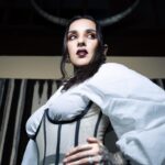Tatiana Shmayluk Instagram - “Am I Evil? Yes, I Am” • 🕷️Halloween’s around the corner! 🕸️ And as most of you adore this holiday, I thought it would be a perfect time to drop another small selection of prints (LIMITED). This one is a lost gem that I absolutely love because of the turn the photoshoot had taken (the horns are a part of a bull’s skull hanging behind my head, which helped me to transform myself into this mystic character). Corset: @clantwentyone #selfportraitphotography • • Shop @tatisrealm ✨(link in bio).