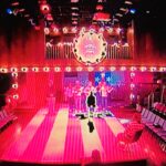Tavi Gevinson Instagram - One time @andygrote was talking about the feeling of having accidentally skipped a chunk of text onstage. “Suddenly, I was in the future!” I was delighted to have these words for a sensation I have only ever experienced while doing a play. When you perform it over and over and learn other actors’ rhythms that intimately, and then a scene slows down or speeds up or skips, it feels like time travel! Like someone’s fucking with the fabric of time. Yesterday we learned that Sunday had been our last performance of Assassins, a week before our official closing, due to COVID cases. Suddenly we’re in the future. I am so sad that we don’t get a few more shows nor the closing night goodbye and usual grieving rituals. I am grateful that we got to perform as long as we did, especially after our first rehearsals were halted in March 2020. And for vaccines and boosters that kept us from having worse news in this moment. I am also grateful for our company and crew, @classicstage, our vaccinated & masked audiences, John Doyle for this unbelievable group/production, and for John Weidman & Stephen Sondheim for writing a singular piece of theater about American ideals and nightmares. Such a disturbing play shouldn’t be this fun to perform but such is its genius. Any energy I put into it came back tenfold; I learned so much simply from saying their words and sharing the stage with these talented, generous people. I’ve memorized all their faces and backstage habits. I’m obsessed with them. What will I ever do without the ability to watch their scenes as I please! Plus we all got to share the experience of performing it for Weidman and Sondheim. Thank you for waiting two years to see it, standing in line in the cold, being such rapt audience members. It was the most fulfilled I’ve ever felt by work. I’ll remember it forever. #AssassinsCSC