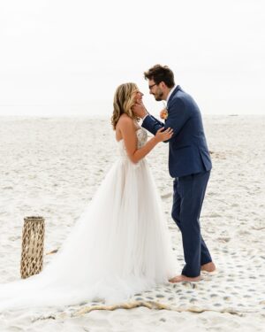 Taylor Dooley Instagram - Living in a real life fairytale ✨ So excited to share photos from our wedding day…first up, our beach ceremony 💛 It was perfectly imperfect, the most unplanned & unstressfull day filled with so much love. We read our own vows that we had written, we laughed, we cried, we got interrupted by a dog who hilariously ran into our ceremony, we praised the Lord, and we LOVED. It was simply the Best. Day. Ever. 😍 check my stories & highlights for more moments from the day 🥰