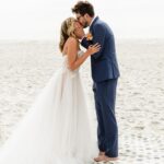 Taylor Dooley Instagram - Living in a real life fairytale ✨ So excited to share photos from our wedding day…first up, our beach ceremony 💛 It was perfectly imperfect, the most unplanned & unstressfull day filled with so much love. We read our own vows that we had written, we laughed, we cried, we got interrupted by a dog who hilariously ran into our ceremony, we praised the Lord, and we LOVED. It was simply the Best. Day. Ever. 😍 check my stories & highlights for more moments from the day 🥰