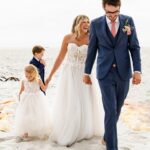 Taylor Dooley Instagram - Living in a real life fairytale ✨ So excited to share photos from our wedding day…first up, our beach ceremony 💛 It was perfectly imperfect, the most unplanned & unstressfull day filled with so much love. We read our own vows that we had written, we laughed, we cried, we got interrupted by a dog who hilariously ran into our ceremony, we praised the Lord, and we LOVED. It was simply the Best. Day. Ever. 😍 check my stories & highlights for more moments from the day 🥰