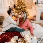 Taylor Dooley Instagram - Best. Present. Ever. 🎁🥰 …him forever (& @theadventurechallenge 😉) // We seriously had the BEST at home date night curtesy of The Adventure Challenge. It was spontaneous and fun and full of Christmas magic ✨ We laughed, we cuddled, we watched our favorite Christmas movie, we made so many fun memories…and we even had a little visitor sneak out of his room to join in on the fun (swipe to the last photo to see our little visitor) 😬 Being busy parents, it’s hard to find intentional time together…The Adventure Challenge made it so easy and fun for my hubs and I to reconnect and recharge together. We truly had the time of our lives and we can’t wait to scratch off more adventures together ❤️ Go get yours & start making memories - use code: XMAS25 for 25% off your entire order!! 🎄To my favorite adventure buddy, I love you endlessly…date night again asap? 😍