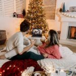 Taylor Dooley Instagram - Best. Present. Ever. 🎁🥰 …him forever (& @theadventurechallenge 😉) // We seriously had the BEST at home date night curtesy of The Adventure Challenge. It was spontaneous and fun and full of Christmas magic ✨ We laughed, we cuddled, we watched our favorite Christmas movie, we made so many fun memories…and we even had a little visitor sneak out of his room to join in on the fun (swipe to the last photo to see our little visitor) 😬 Being busy parents, it’s hard to find intentional time together…The Adventure Challenge made it so easy and fun for my hubs and I to reconnect and recharge together. We truly had the time of our lives and we can’t wait to scratch off more adventures together ❤️ Go get yours & start making memories - use code: XMAS25 for 25% off your entire order!! 🎄To my favorite adventure buddy, I love you endlessly…date night again asap? 😍