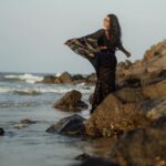 Teja Venkatesh Instagram - “Embracing the serenity of a breezy beach day, draped in a black saree, with the sunset as my companion. What more could one ask for?” : In frame @tejavenkateshoffl ✨ Shot by @sriram.k_dop ✨ Mua @sha_thebridesroom ✨
