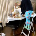 Teri Hatcher Instagram - It’s that time of year again!🎄🎁❄️For those who’ve been along this ride with me year after year….see if you can spot the cool new thing I added to the design. This build too 3 viewing of #elf 1 #theholiday & 1 #homealome3. It was a long but worthwhile one. I think it may be my favorite. . Also prize for the person that is first to count all the Christmas wardrobe items ( hats, sweaters, pants). Leave your guess in the comments. #merrychristmas #happyholidays #christmasvillage #crafts #christmasdecor #traditions