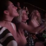 Tessa Netting Instagram - Y’ALL this month has been one of the most overwhelming and stressful months of my LIFE but last week I GOT TO GO TO THE TAYLOR SWIFT ERAS TOUR WORLD PREMIERE and had to take a moment on here to document it because I can’t even believe that this happened??!! I am so lucky?!?! HELP?!?!? Not only did I get to see THE QUEEN @taylorswift HERSELF IN THE FLESH RIGHT IN FRONT OF ME (I will never shut up about it) but watching this movie with my friends @tashapolis @xtinemay & @tayamillerr was SO MUCH FUN and perfectly captured the energy of the Eras Tour. If you weren’t able to get tickets to see Taylor Swift perform live then GET TICKETS TO SEE THIS MOVIE !!! You can still make & trade friendship bracelets, dress up like your favorite Era (I was rockin a bleachella reputation fit), buy collectible popcorn buckets, and sing your heart out to celebrate Mother with your fellow Swifties. Remember to be respectful & kind to your movie theater employees AND HAVE A BLAST. I definitely want to try and see it again with more friends if I can!! A big THANK YOUUUUUU to @taylorswift @taylornation & @cinemark for the invite!!! IT WAS RARE. I WAS THERE. AND WILL REMEMBER IT ALL TOO WELL FOR THE REST OF MY LIFE. If you haven’t yet get your Taylor Swift The Eras Tour movie tickets from @cinemark IN-MAH-BIO ❤️ #taylorswift #tstheerastourfilm #taylornation #erastourmoviepremiere #erastourmovie #tstheerastour