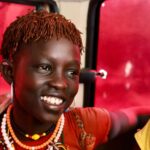 Thomasin McKenzie Instagram - @sotheycan first met Kamsino and Chepoghon on their 40-kilometre round trip by foot to collect cooking oil and flour for their households. The girls explained how they had never been to school and were about to undergo female genital cutting (FGC) to prepare them for marriage. Their hair had already been put into red coils as advertisement to show they were on the market to be sold. Kamsino and Chepoghon admired the idea of attending school, but were unaware that this was option for them. Instead, their futures were mapped out for them — child marriage, early pregnancy and unpaid labour is the norm for many girls and women in their community. A couple of weeks after meeting the girls, So They Can’s local team was able to connect with their parents and discuss the risks of FGC, as well as the importance of education for girls. Following these conversations, both households decided they would not progress with their plans to cut and sell off their girls and instead, with So They Can’s support, send their girls to school for the first time ever. This International Day of the Girl Child, please join me in standing up for girls just like Kamsino and Chepoghon by advocating for their fundamental rights to education, safety and dignity. My thoughts also go out to the children of Israel and Palestine. This tragedy and their suffering is incomprehensible. #internationalgirlsday #girlsrights #endchildmarriage #educationforall