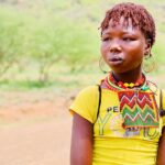 Thomasin McKenzie Instagram - @sotheycan first met Kamsino and Chepoghon on their 40-kilometre round trip by foot to collect cooking oil and flour for their households. The girls explained how they had never been to school and were about to undergo female genital cutting (FGC) to prepare them for marriage. Their hair had already been put into red coils as advertisement to show they were on the market to be sold. Kamsino and Chepoghon admired the idea of attending school, but were unaware that this was option for them. Instead, their futures were mapped out for them — child marriage, early pregnancy and unpaid labour is the norm for many girls and women in their community. A couple of weeks after meeting the girls, So They Can’s local team was able to connect with their parents and discuss the risks of FGC, as well as the importance of education for girls. Following these conversations, both households decided they would not progress with their plans to cut and sell off their girls and instead, with So They Can’s support, send their girls to school for the first time ever. This International Day of the Girl Child, please join me in standing up for girls just like Kamsino and Chepoghon by advocating for their fundamental rights to education, safety and dignity. My thoughts also go out to the children of Israel and Palestine. This tragedy and their suffering is incomprehensible. #internationalgirlsday #girlsrights #endchildmarriage #educationforall