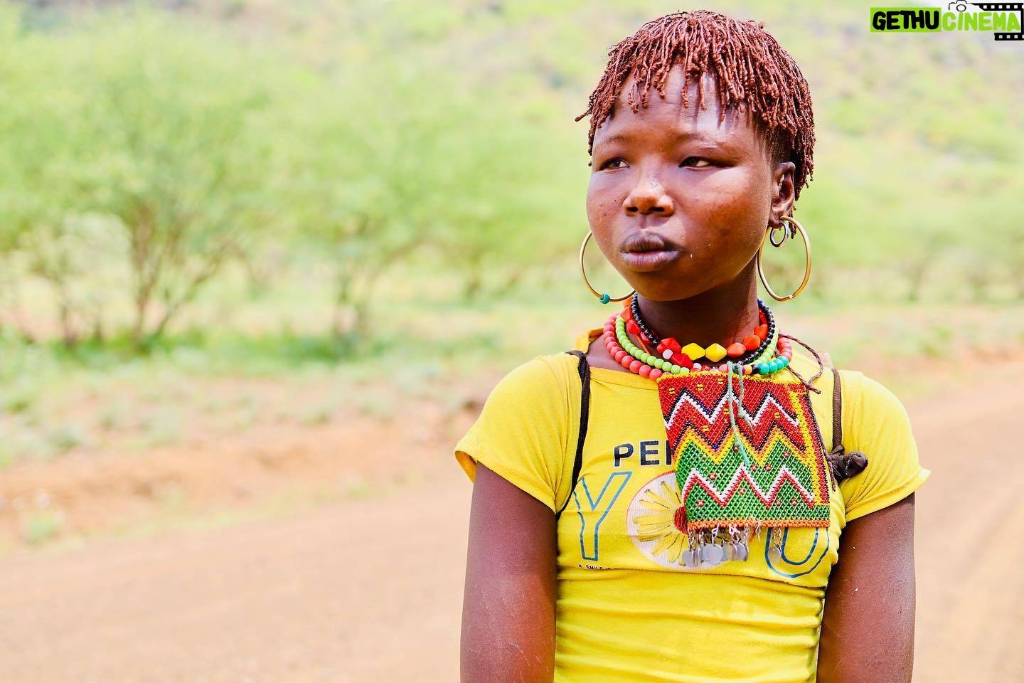Thomasin McKenzie Instagram - @sotheycan first met Kamsino and Chepoghon on their 40-kilometre round trip by foot to collect cooking oil and flour for their households. The girls explained how they had never been to school and were about to undergo female genital cutting (FGC) to prepare them for marriage. Their hair had already been put into red coils as advertisement to show they were on the market to be sold. Kamsino and Chepoghon admired the idea of attending school, but were unaware that this was option for them. Instead, their futures were mapped out for them — child marriage, early pregnancy and unpaid labour is the norm for many girls and women in their community. A couple of weeks after meeting the girls, So They Can’s local team was able to connect with their parents and discuss the risks of FGC, as well as the importance of education for girls. Following these conversations, both households decided they would not progress with their plans to cut and sell off their girls and instead, with So They Can’s support, send their girls to school for the first time ever. This International Day of the Girl Child, please join me in standing up for girls just like Kamsino and Chepoghon by advocating for their fundamental rights to education, safety and dignity. My thoughts also go out to the children of Israel and Palestine. This tragedy and their suffering is incomprehensible. #internationalgirlsday #girlsrights #endchildmarriage #educationforall