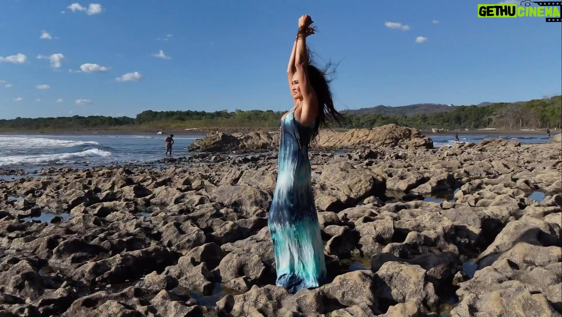 Tia Carrere Instagram - Soaking up the sun, playing with drones, in my beautiful @michellejonasdesigns dress… @pedebevec #drone #dronephotography #dronestagram #dronevideo