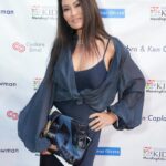 Tia Carrere Instagram - Rocking my @michellejonasdesigns on the red carpet @skirball_la for the wonderful @mendingkids gala, meanwhile earlier in the day…. 😳🤣