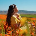 Tiffany Alvord Instagram - ✨Nothing like poppy fields in spring! 🥰 // Also have you seen my new video? // link in Bl0 🎶// It’s a video of me singing first ever cover on YouTube! 💭 Fun-fact I had a first kiss in a poppy field! 🙈