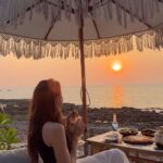 Tiffany Lau Instagram – when you stumble upon a beach side oasis 🌊🌅 watching the sunset, with a table full of food is a vibe 😋