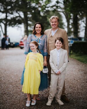 Triona McCarthy Instagram - We might have forgotten Mini’s sandals so she’s in a pair of tap dancing shoes we found in the boot & Maxi refused to have his hair cut & Will wanted to wear a tie with his suit & I had a stick on bra that slid down my legs half way through the ceremony-but for a few seconds we looked like we had our shizz together for this family foto ✨