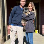 Trista Sutter Instagram - After the heartbreak of losing our sweet Sophie Bear, we knew that the best way to heal would be to welcome another rescue from @lightshine_canine - the angels who brought us our Sophie! 😇 We patiently waited and worked hard to get settled in our home (although there are still boxes to go through and furniture to order and and and 🤪), and the time finally felt right. 🎯 We are beyond happy to welcome sweet Kota Bear to the family and can’t wait to share him with you! 🐶 #kotatherescue #rosebudrezdog #welcometothefamily #thecameralovesyouandsodowe