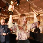 Trudie Styler Instagram - This week, I am thrilled to spotlight screenwriter and director @justine.triet, celebrating her Golden Globe wins for #AnatomyOfAFall! 🏆 From documenting protests to capturing the French presidential election to her first feature film Age of Panic, Justine’s filmmaking career spans from compelling documentaries to incredible storytelling. Her latest project Anatomy of a Fall, won both Best Screenplay and Best Foreign Language Film at the Golden Globes this year. The film weaves a riveting story around a celebrated writer named Sandra who is put on trial when her husband falls to his death from their secluded chalet, with her blind son as her sole witness. Sandra Huller delivers a captivating performance which is subtle yet complex and shows what a powerhouse she really is. The movie, hailed for its exploration of truth’s complexities, marks a significant achievement for the entire team. Congratulations on your monumental wins!