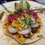 Ulrika Jonsson Instagram – So.
Everyone who knows me well, knows this is my happy place.
Cooking. Hosting. Table-laying. Flower arranging. Making a fuss. Paying attention to detail.
And generally wearing myself out.

Third Ungrateful requested tacos for her 18th.
And she got more than she bargained for.

Beef fillet tacos.
Pork Carnitas.
Courgette, corn, shallot, mint, feta tacos.
Guacemole.
Too much cheese. 
Pink pickled onions.
Refried beans.
Sriracha mayo.
Chargrilled corn. And pineapple (just cos).
All the trimmings.
A lot of rum and limes.
And Frida Kahlo came, too.

Hostess with the mostest.
And yes, ALL Mexican people have moustaches and wear sombreros. Fact.