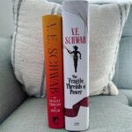 V. E. Schwab Instagram - Same wordcount! Different vibe. Behold, the US and UK hardcovers of The Fragile Threads of Power, in all their glory. The US has taken the STEALTH approach, meant to lure readers into a false sense of security by appearing slimmer than it is. The UK has taken the CHONK approach, reminding readers that while this book won’t fit easily into a purse or satchel, it CAN be used as a weapon. Lila Bard approves of both. #shadesofmagic #threadsofpower #veschwab