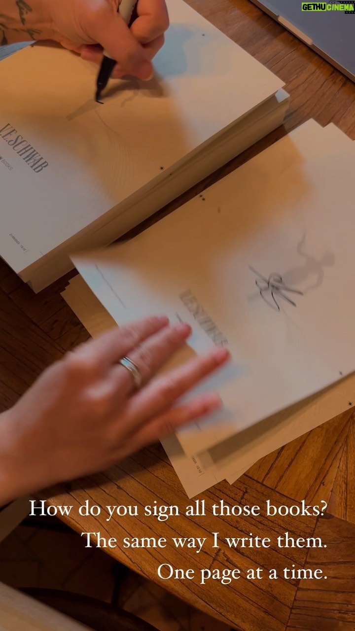 V. E. Schwab Instagram - How do you sign all those books? The same way I write them. One page at a time. (And also while bingeing TV shows, so please send me your recs.) #veschwab #addielarue #shadesofmagic #threadsofpower #vicious #writing #advice #creativity