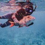 Valentine Thomas Instagram – Party of 2 getting it done. Almost 7 months in. I was pretty stocked to get a mutton snapper as it’s not an easy fish to get. Can always count on @redtidespearfishing gear (and for the male wetsuit so I could fit in it 😂)! And @laurensarasua made an absolute feast with it 😍 So grateful that my daughter will have those incredible ladies as an example around her 😍 We caught, cleaned and cooked (and let the boys clean ha!). #fishing #spearfishing #catchcleancook #pregnancy #semidomesticated 

📷 @ggerbasi