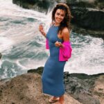 Vanessa Rubio Instagram - I have a crush on @crushcashmere ✨this soft fuchsia cardigan has been my cozy travel sweater and gives me color joy 🤩 I bought a @crushcashmere top a year ago. I loved the soft breathable feel of it and its delicate color. It felt fun, fresh, and intentional with its color (big thing for me 😁) I then learned that the company and it’s founder, Jill Shaw, are aligned with so many things that are important to me, like ethical sourcing, recycled packing and having FUN with shapes and color 🩵 Here’s some words directly from @crushcashmere : Sustainability & responsible practice has always been at the heart of the CRUSH story. We are proud to work with a fully traceable, vertically-integrated supply chain from goat to garment. This beautifully dyed cashmere top is woven from Mongolian goat fiber. CRUSH is a proud partner of the Sustainable Fibre Alliance (SFA), a nonprofit organisation working to create a more sustainable cashmere supply chain. The SFA work with key stakeholders to:  ·       Restore grasslands  ·       Promote animal welfare  ·       Support the livelihoods of herders CRUSH packaging is currently 90% recycled. Thanks for making fun cashmere wear @crushcashmere ✨