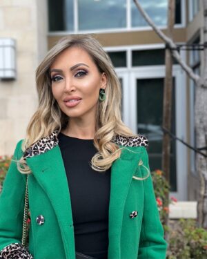 Veronika Mindal Instagram - Dressed in green, honoring the spirit of St. Patrick and Irish heritage. Happy St. Patrick’s Day! 🍀 
.
.
.

Coat by  @retrostage_official 
Dress #zara
Bag #aldo 
Shoes #calvinklein 
.
.
.
.
.
#actress #model #maturemodel #singer #songwriter #Hollywood #LosAngeles #NewYork #Paris #Milan #Ukraine #talent #artist #Instagram #Instastyle #tattooedgirl #Insta #vogue #style #outfit #fashioninspiration #retrostage, #retrostagedesign  #veronikamindal  #IrishPride #StPatricksDay”