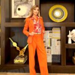 Veronika Mindal Instagram - Too cool for mellow yellow, rocking orange instead! After moving to Orange county, I’m became in love in orange color 🍊 Blazer & bracelet by #ralphlauren Pants by #hugoboss Belt by #versace Follow for more fashion and music inspiration #actress #model #maturemodel #singer #songwriter #Hollywood #LosAngeles #NewYork #Paris #Milan #Artist #Instagram #Instastyle #tattooedgirl #Insta #Bloomingdale #dress #mature #fashion #design #fashiondesign #macys #певица #актриса #Fashionblogger #veronikamindal