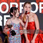 Violet McGraw Instagram - Last night at the @hollywoodcreativealliance #AstraAwards was a dream! Loved getting to spend it with @madeleinemcgraw and @jennadavis So proud of our movie @meetm3gan Thank you @blumhouse @universalpictures @atomicmonster for an experience of a lifetime! Hair: @_douglasjack Makeup: @jennanicoleofficial Stylist: @veronica.graye Fit: Purse @meliebianco Shoes @shopcider Jewels @idyl Dress @georgeshobeika