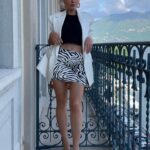 Virginie Conte Instagram - 🌊 Let’s travel the world and make memories on different hotel balconies @ghtlakecomo Zebra skirt @misenscene.world Publicité